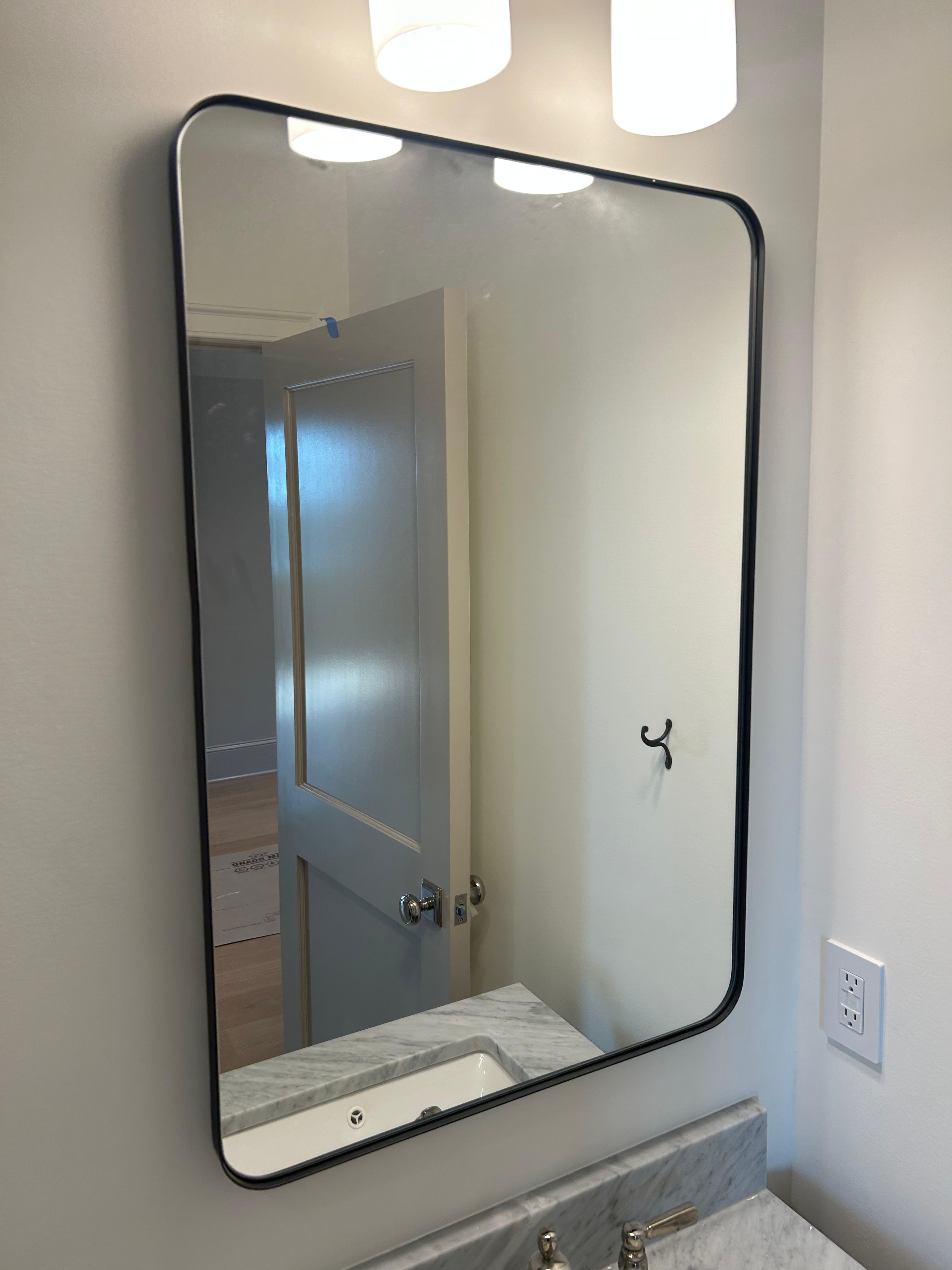 Custom bathroom mirror installation